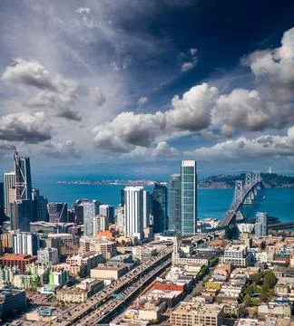 Aerial view of San Francisco road to Bay Bridge and city skyline from helicop Stock Photos