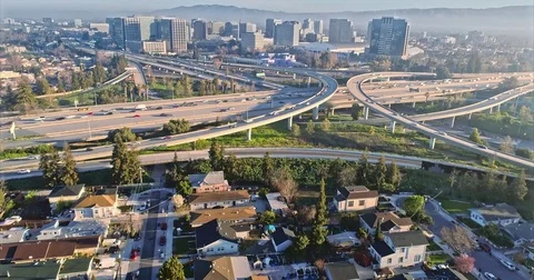 Aerial View Of San Jose City And Congested Freeway Traffic At Rush Hour Stock Footage