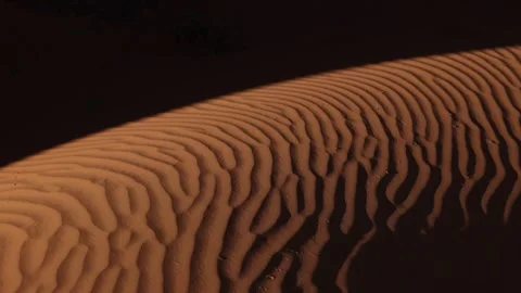Aerial view of sand dune light and shadow create amazing patterns in Sahara Stock Footage 304112371