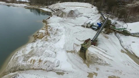 Aerial view of a sand extraction site covered with snow. Stock Footage 86528992