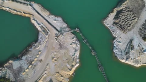 Aerial View of Sand Quarry with Blue Water and Forest in Germany Stock Footage 313219794