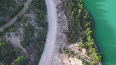 Aerial View of Sand Quarry with Blue Water and Forest in Germany Stock Footage 313220072