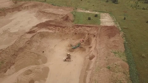 Aerial view of the sand quarry with heavy equipment Stock Footage