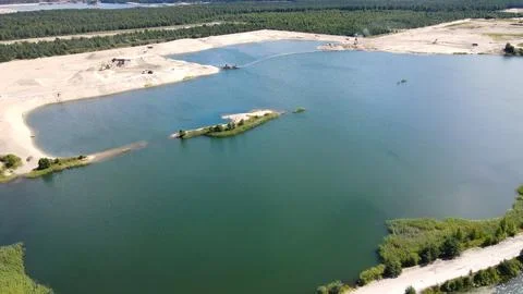 Aerial view sand quarry mining operation with artificial lakes Stock Photos