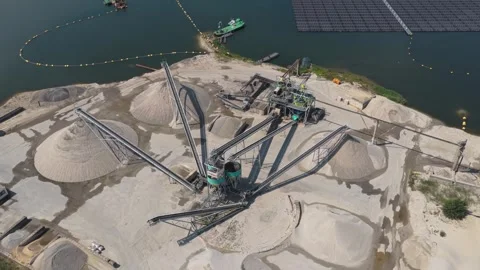 Aerial view of sand quarry processing plant with conveyor belts Stock Footage 341874299