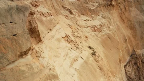 Aerial view sand wall. Flight over sand quarry, industrial extraction of sand Stock Footage 136200084
