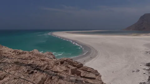 Aerial view of a sandbar connecting two sea shores in socotra Stock Footage 334680880