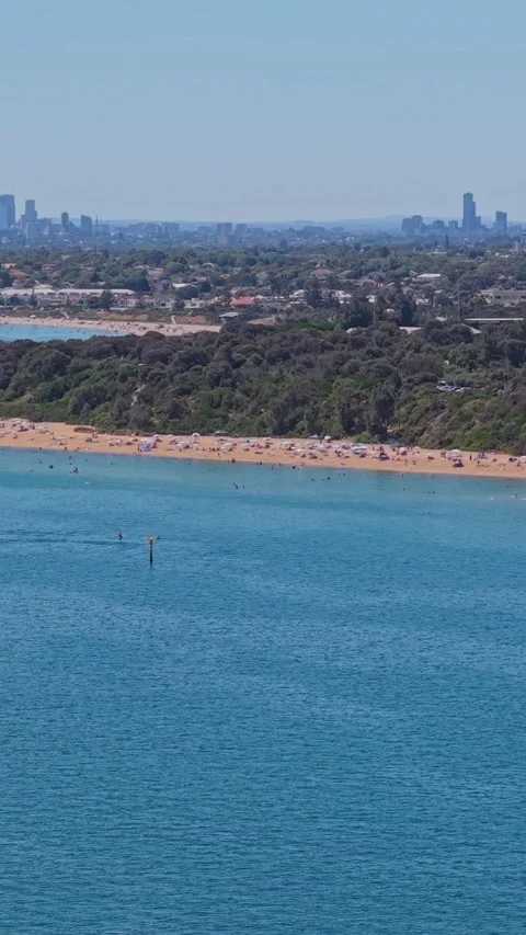 Aerial View of Sandringham Beach with Melbourne Skyline in Background 스톡 동영상 327911652