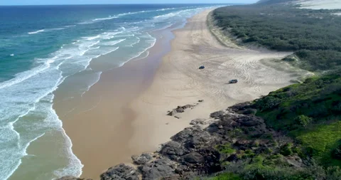 Aerial view of sandy beach with 4x4 vehicles,Fraser Island,Queensland,Australia Stock Footage 140554530