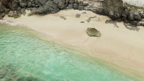 Aerial view of sandy beach and ocean with waves. Balangan Beach on Bali Stock Footage 136497634