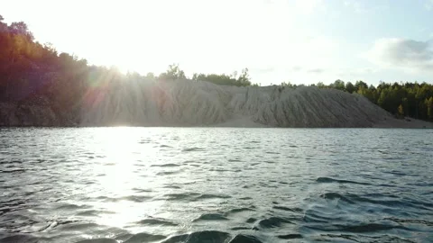 Aerial view of a sandy beach and sandy rocks, white sand and a river with waves. Stock Footage 162255524