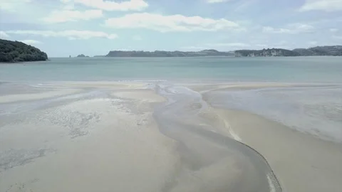 Aerial view of the sandy beach and the sea at new chums beach, new zealand Video stock 221229086