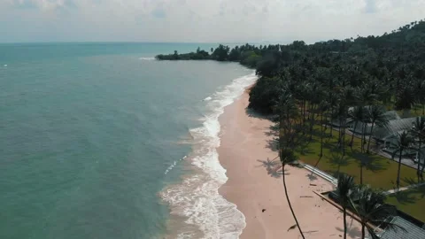 Aerial view of sandy beach and infrastructure on the island of samui Stock Footage 229677528