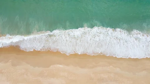Aerial view of sandy beach and ocean with waves Stock Footage 233771280