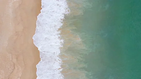 Aerial view of sandy beach and ocean with waves Stock Footage 233771545