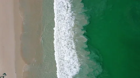 Aerial view of sandy beach and ocean with waves Stock Footage 233785192