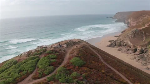 Aerial view of sandy beach and cliffs along the coastline, United Kingdom. Stock Footage 288464885
