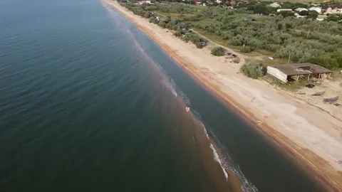 Aerial view of sandy beach during golden hour. Panoramic shot. Stock Footage 164453652