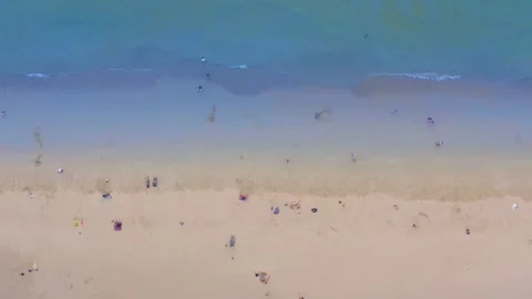 .Aerial view the sandy beach is framed by a winding canal. Video stock 247389408