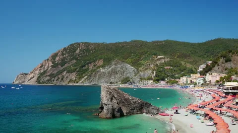 Aerial view to the sandy beach full of tourists in Monterosso al Mare in the Stock Footage 61520698