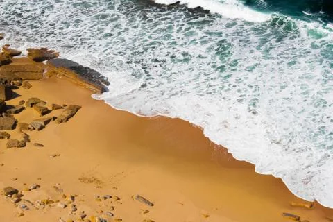 Aerial view of sandy beach Stock Photos