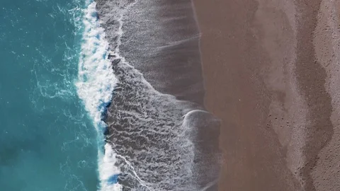 Aerial view of a sandy beach with rocks in Taormina (Sicily) Stock Footage 124132219