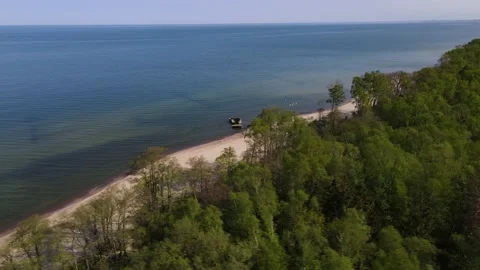 Aerial view of sandy beach, sea and forest on Baltic sea on Curonian spit Stock Footage 154716631