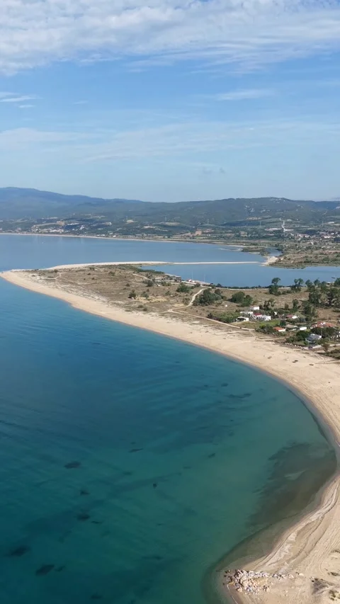 Aerial View of Sandy Beach Spit, Turquoise Sea and Coastal Lagoon in Greece 動画素材 342920509