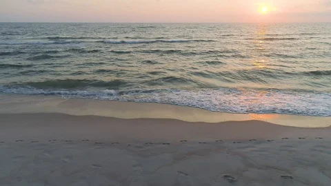 Aerial view of sandy beach at sunset Stock Footage 98139866