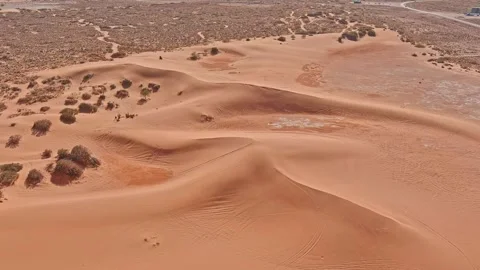 Aerial view of sandy dunes in arid landscape, United States. Stock Footage 288464448