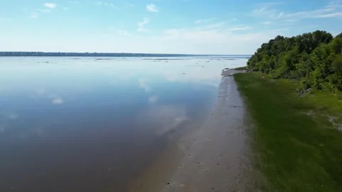 Aerial View of a Sandy Riverbank Beach in Rural Quebec Stock-Footage 338325319