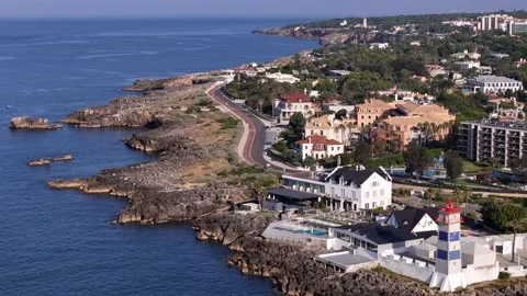 Aerial view of Santa Marta Lighthouse on the rocky coastline, Portugal. Stock Footage 340002476