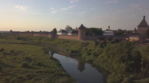 Aerial view on Saviour Monastery of Saint Euthymius and Kamenka river in Suzdal Stock Footage 94039969
