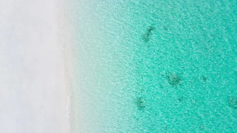 Aerial view scene of top view beach and seawater on sandy beach in summer.  Video stock 204923564