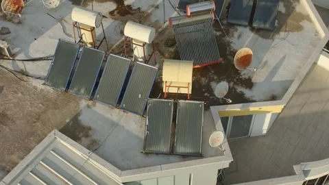 Aerial View: A scenic view of old, weathered roofs in a historic town Stock Footage 296076353