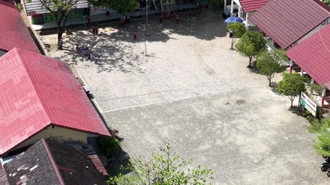Aerial view of the school building and the activities of students playing o.. Stock Footage 338313654