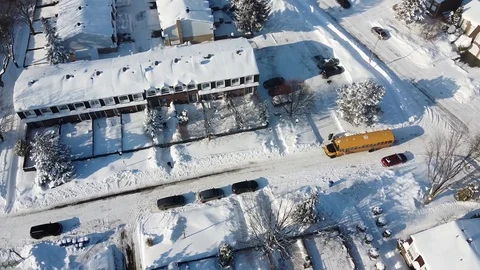 Aerial View of School Bus During Winter Afternoon in Montreal, Canada 스톡 동영상 125338581