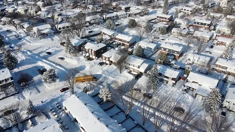 Aerial View of School Bus During Winter Afternoon in Montreal, Canada 스톡 동영상 125338587