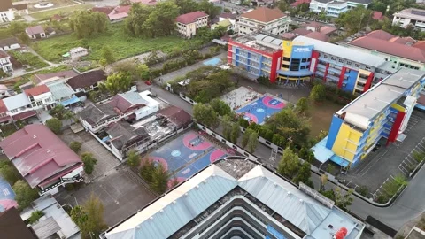 Aerial View of School Complex and Basketball Court in Pontianak 스톡 동영상 347259952