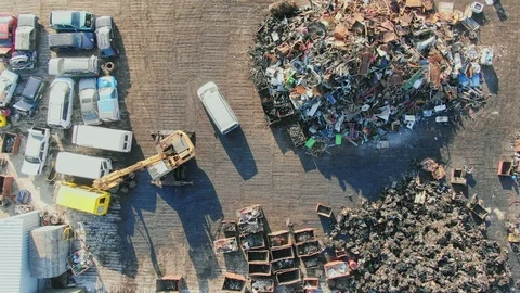 Aerial view of scrap yard with old damage stacked cars. Stock Footage 115173136