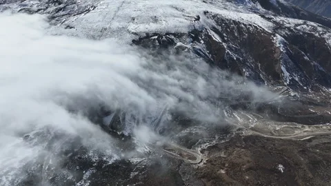 Aerial view of sea of clouds over Yajiageng Mountain in Western Sichuan Stock Footage 332555283