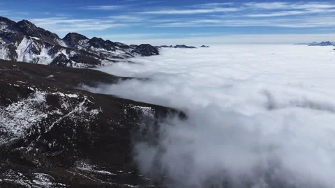 Aerial view of sea of clouds over Yajiageng Mountain in Western Sichuan Stock Footage 332555292