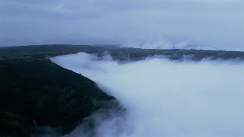 Aerial View of Sea of Clouds Over Misty Mountains in Meghalaya 動画素材 339774693