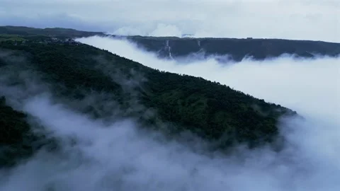 Aerial View of Sea of Clouds Over Misty Mountains in Meghalaya Stock Footage 339774818