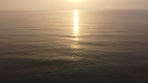 Aerial view of the sea with reflection of the sun on the water Stock Footage 159050427