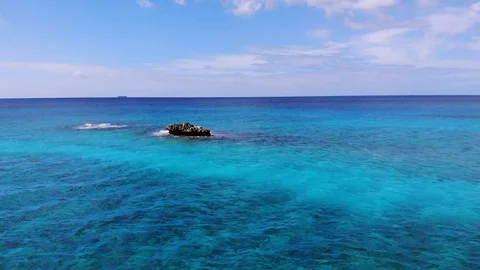 Aerial View of Sea Rocks in Clear Blue Waters, Grand Bahama, Bahamas Stock Footage 105534764