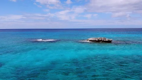 Aerial View of Sea Rocks in Clear Blue Waters, Grand Bahama, Bahamas Stock Footage 105535202