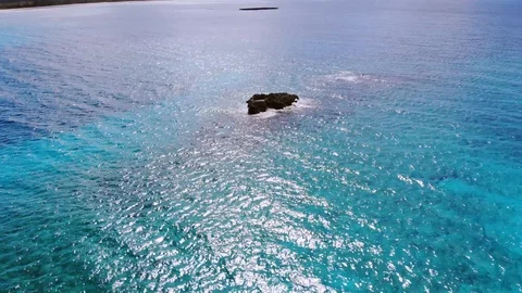 Aerial View of Sea Rocks in Clear Blue Waters, Grand Bahama, Bahamas Stock Footage 105535548