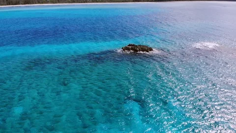 Aerial View of Sea Rocks in Clear Blue Waters, Grand Bahama, Bahamas Stock Footage 105535653