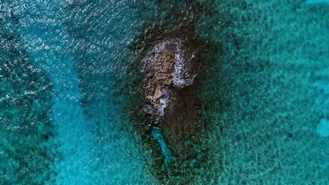 Aerial View of Sea Rocks in Clear Blue Waters, Grand Bahama, Bahamas Stock Footage 105536655